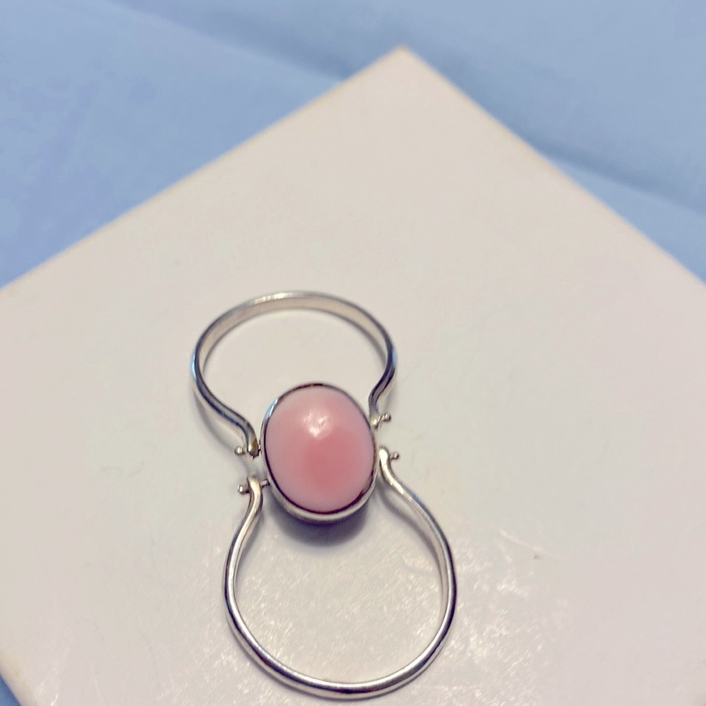 Brand new Size 5 1/2 to 6 ring in pink and teal colour